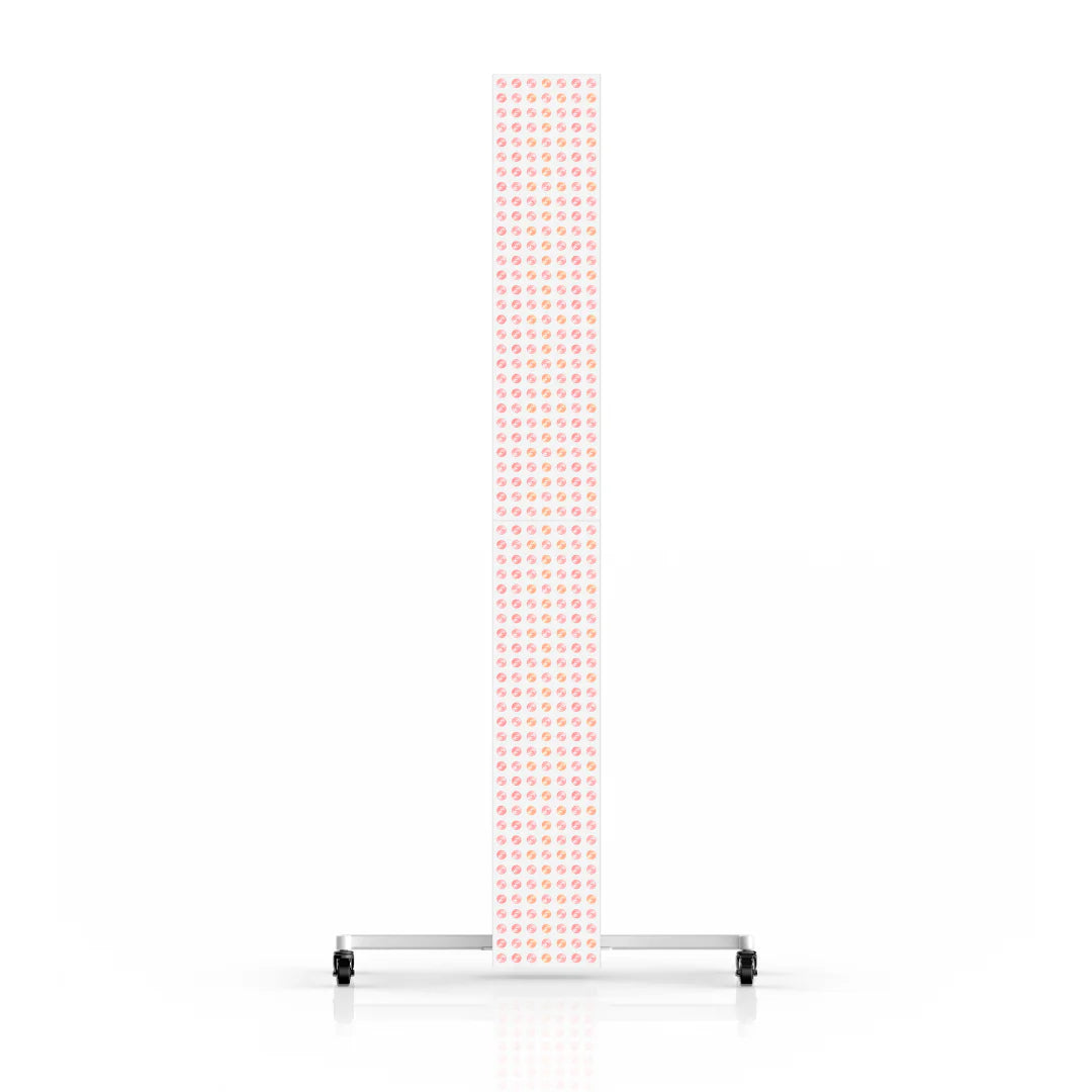 Tall panel with small red lights on a stand.